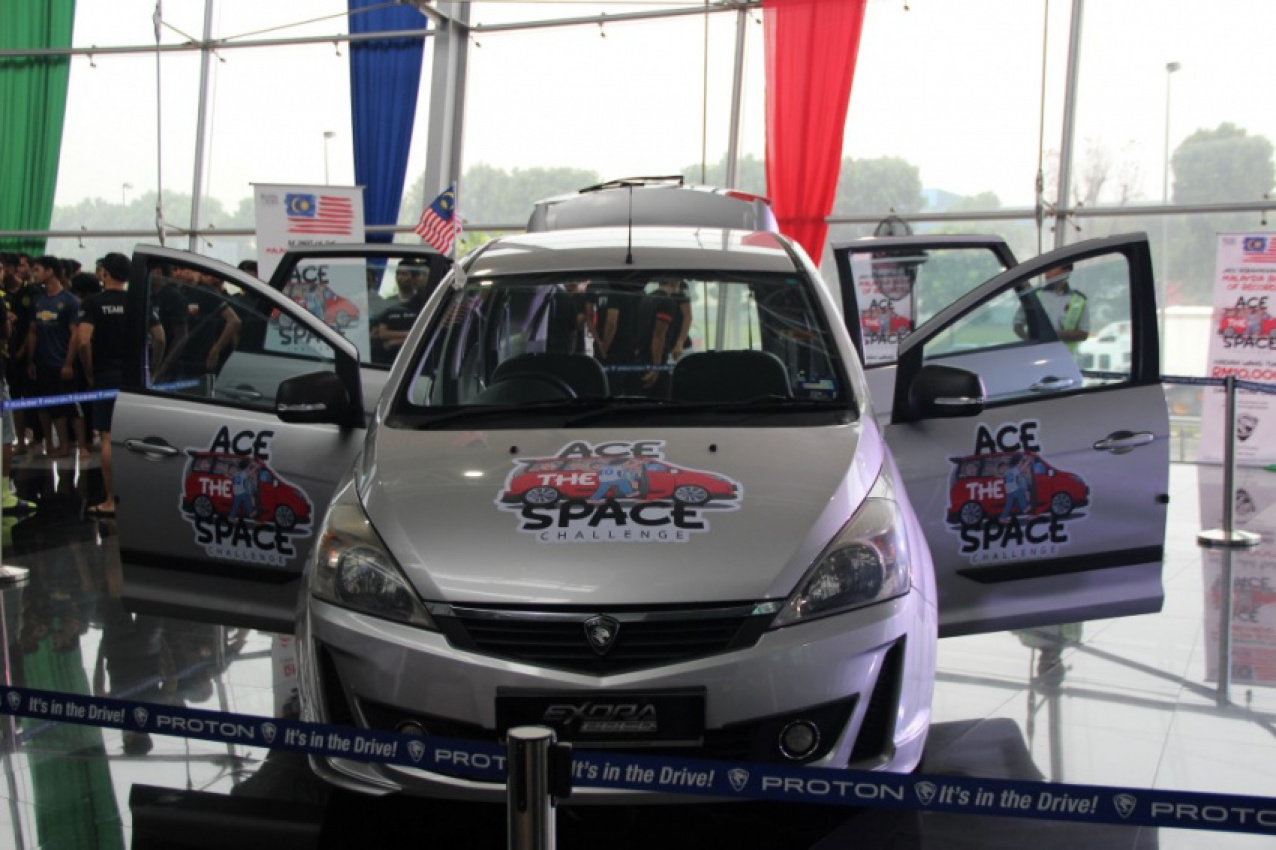 autos, cars, autos proton, proton exora sets new record for 'most people in an mpv'
