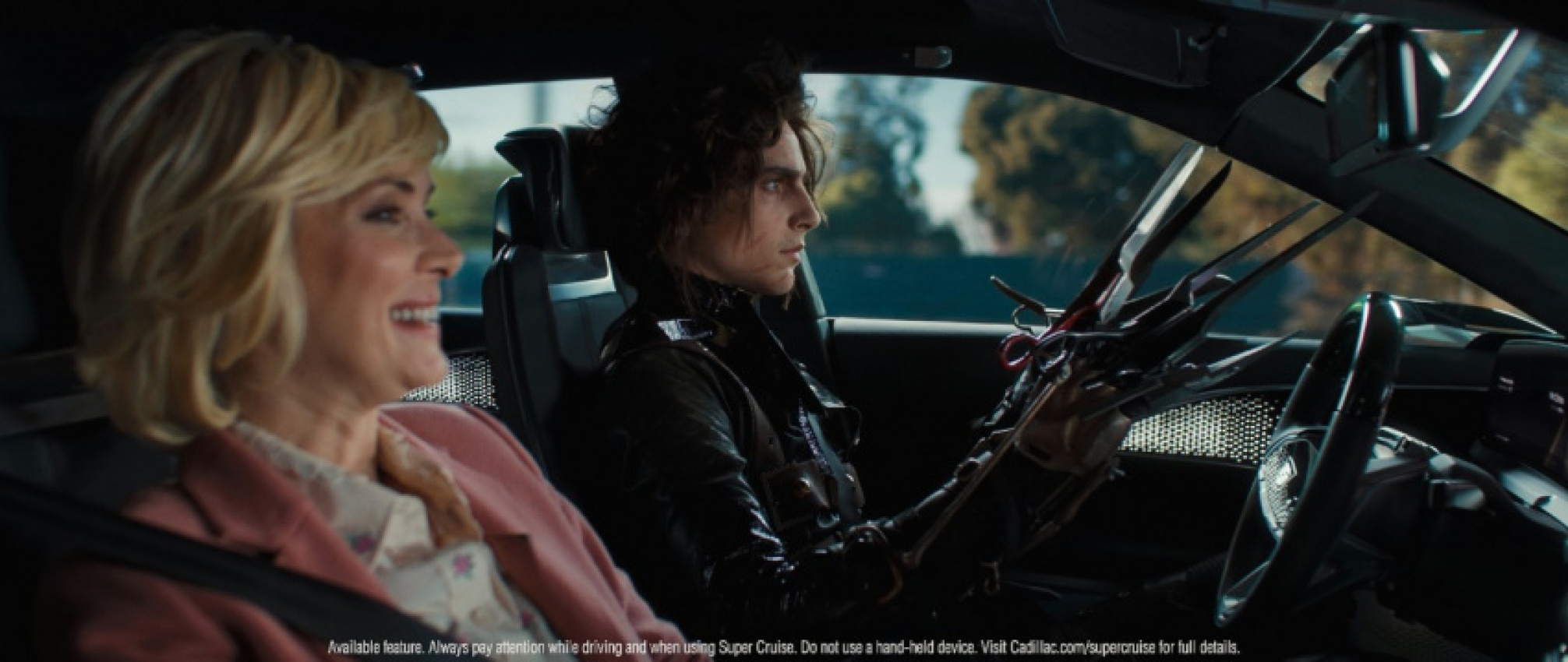 autos, cadillac, cars, electric cars, cadillac lyriq, general motors, super cruise, tim burton, timothée chalamet, winona ryder, cadillac shows off hands-free driver assistance technology in new super bowl ad