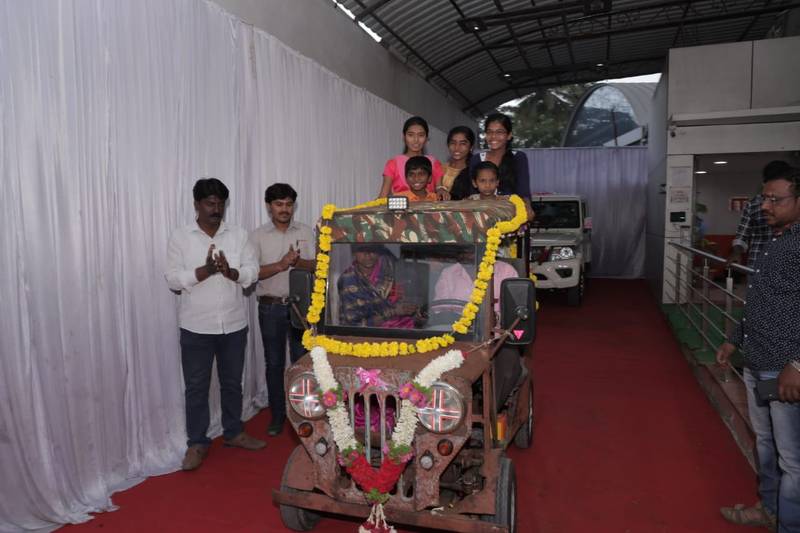 article, autos, cars, mahindra, article, anand mahindra exchanges a car made out of scrap metal with a brand-new bolero