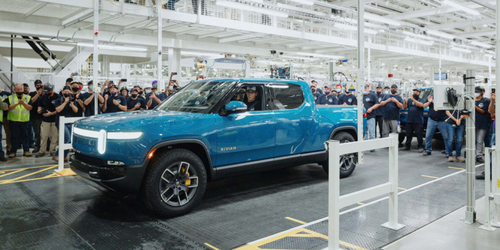 autos, cars, ram, rivian, amazon, rivian paused production earlier this month to hone its manufacturing processes, hoping to ramp up output to 200 evs a week