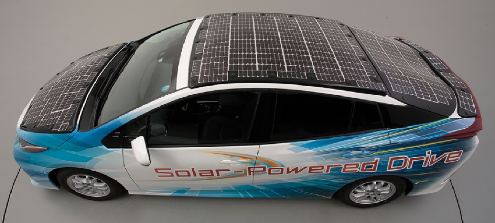 autos, cars, toyota, battery electric vehicle, environmental technology, public road trials, sharp corporation, solar battery cells, solar cells, solar panel, solar power, sp;ar energy, toyota prius, toyota, sharp and nedo to conduct road trials of high-efficiency solar cell panels