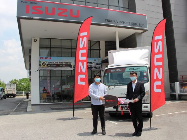 autos, cars, isuzu, isuzu elf, new isuzu dealer celebrates first elf truck handover