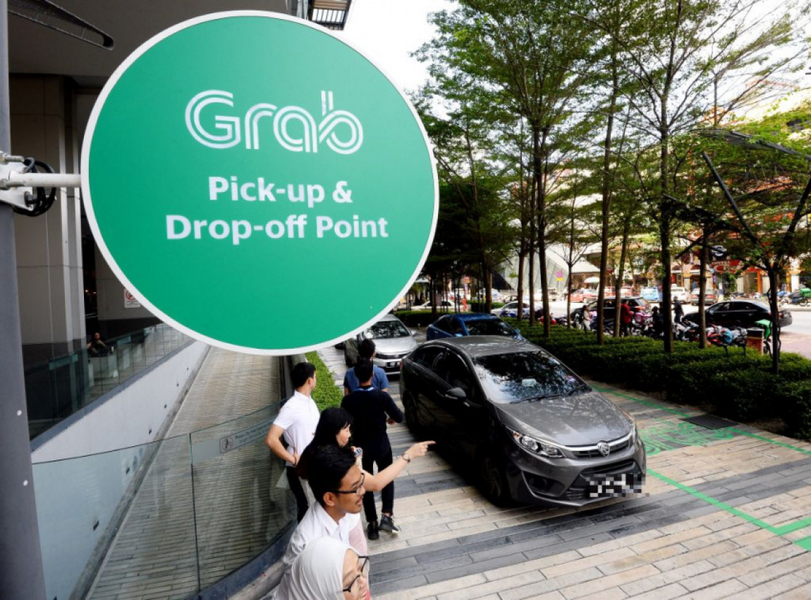 autos, cars, mini, autos news, e-hailing drivers sue grab, transport ministry over workers' rights