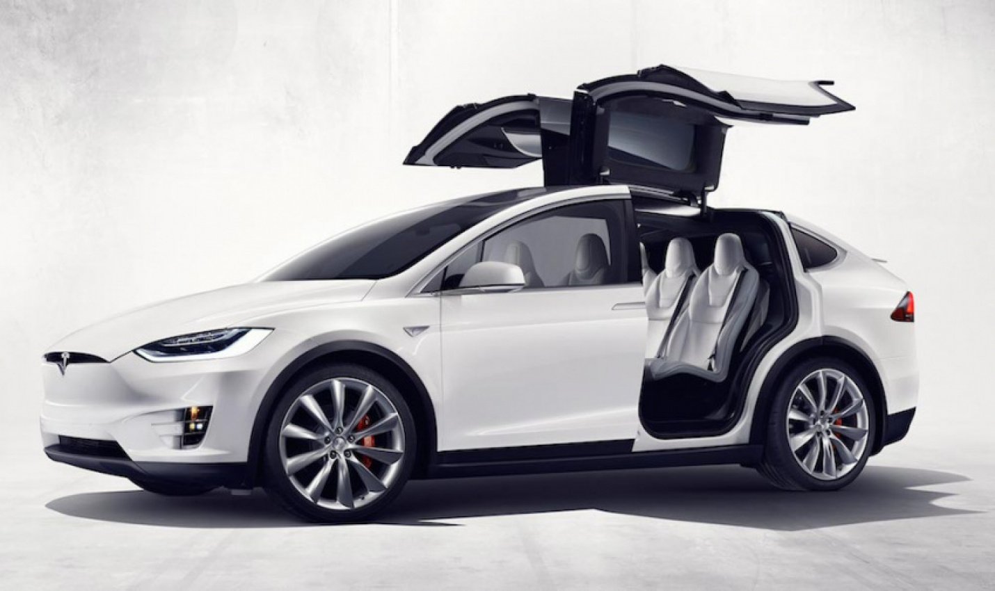 autos, cars, tesla, model x, tesla delivers model x electric suv to take on luxury carmakers