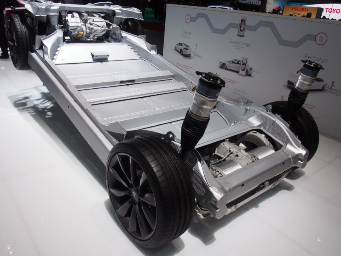 autos, cars, tesla, autos tesla, tesla touts speed and driving range with new upgraded battery