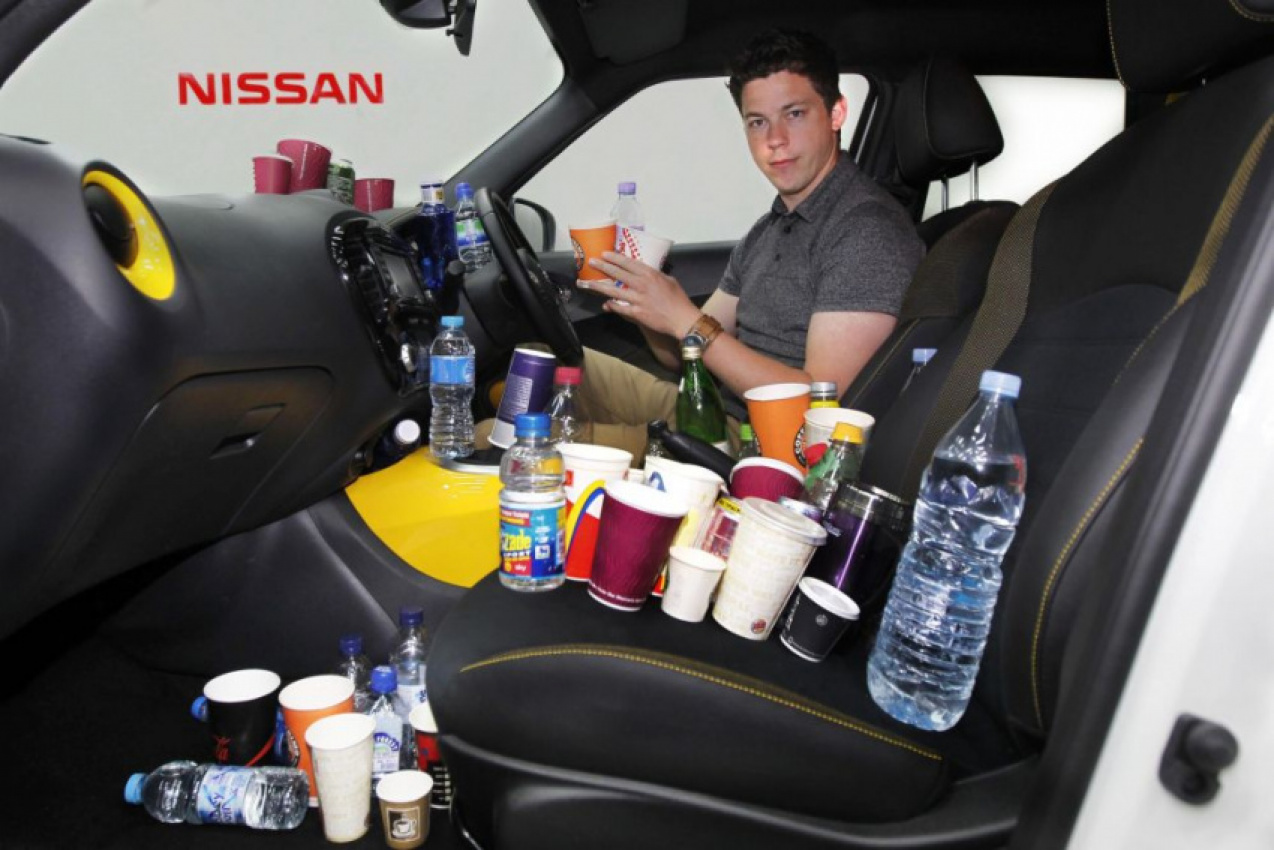autos, cars, nissan, autos nissan, cupholder design no laughing matter at nissan