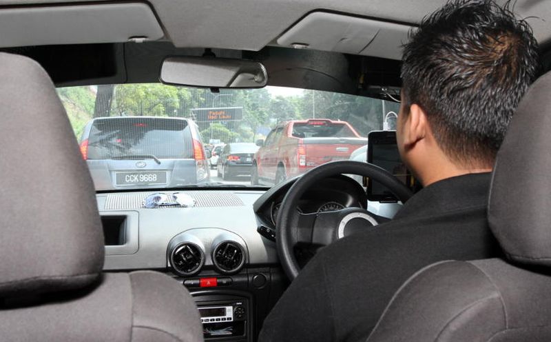 autos, cars, grabcar, laws, uber, existing laws will be used to regulate uber and grabcar
