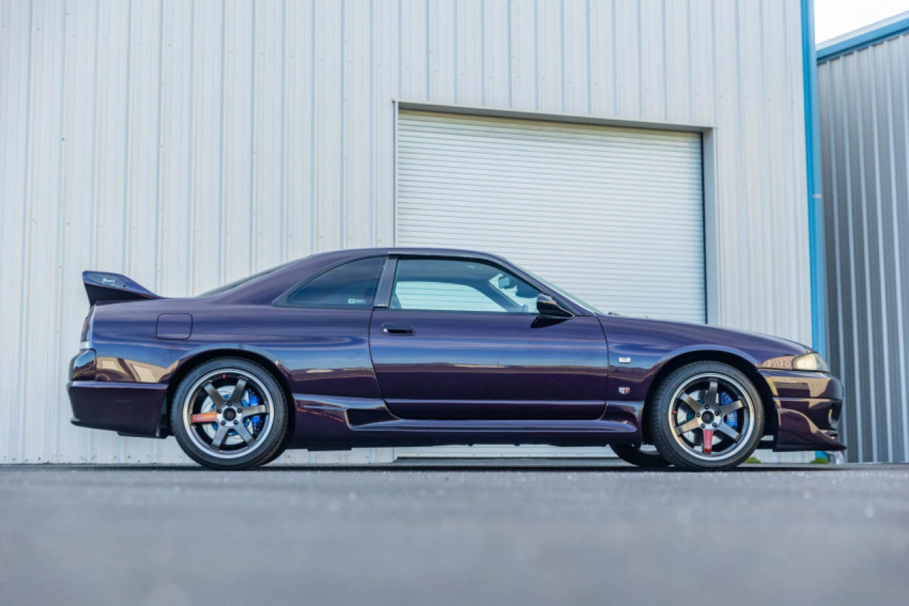 autos, cars, news, nissan, auction, nissan skyline, nissan videos, tuning, used cars, video, time to find out how much this midnight purple nissan r33 skyline gt-r v-spec is worth