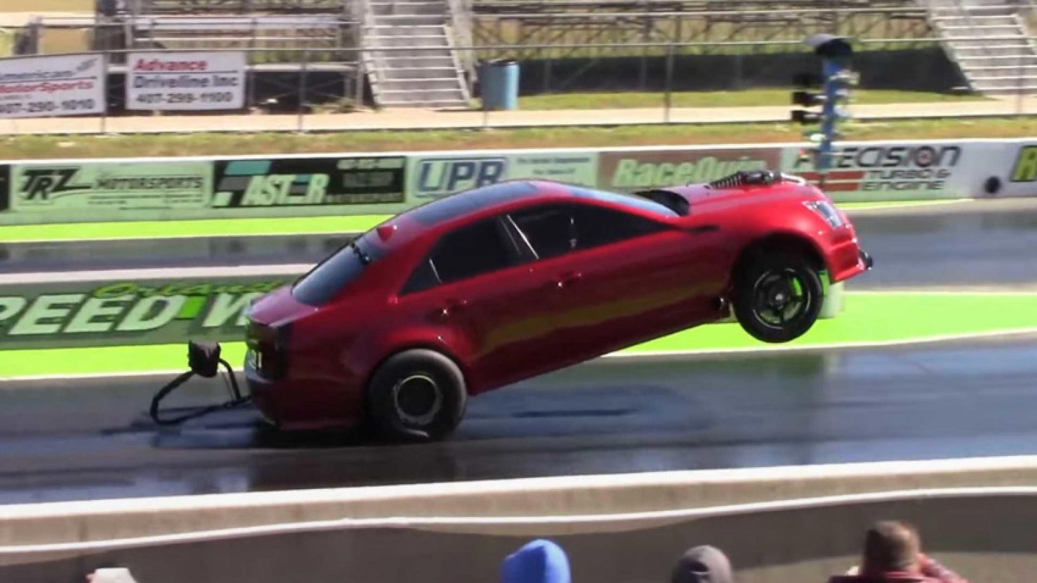autos, cadillac, cars, cadillacs pulling wheelies at drag strip is luxury racing done right
