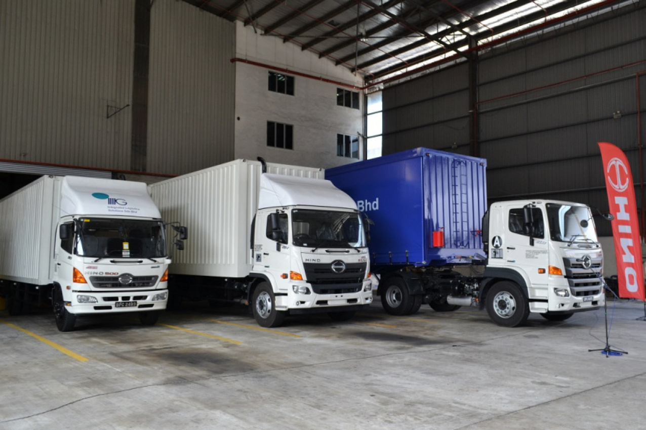 autos, cars, commercial vehicles, hino, hino malaysia delivers 10 trucks to integrated logistics solutions