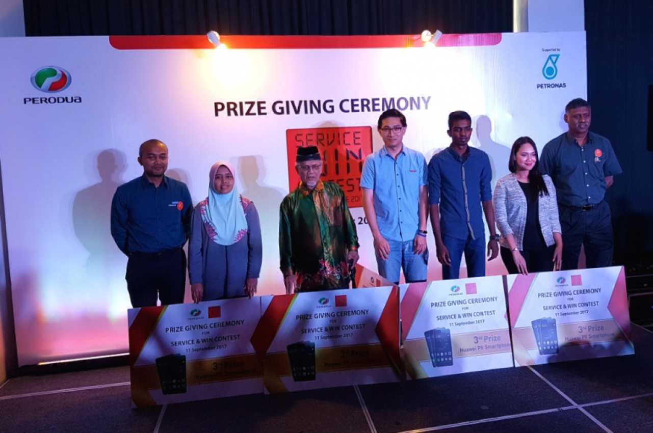 autos, car brands, cars, contest, perodua, perodua presents prizes to service and win contest winners; grand prize – axia.