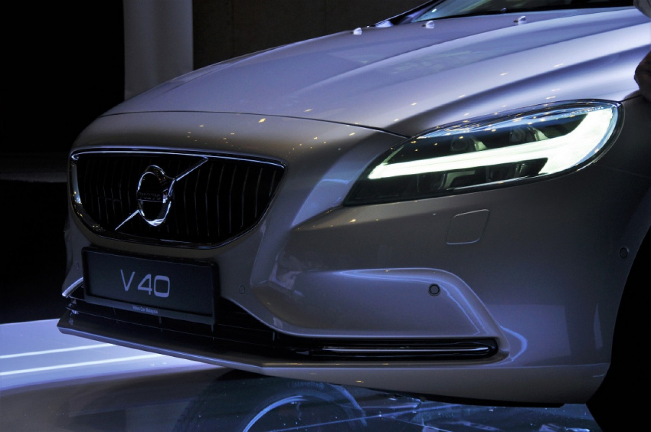 autos, car brands, cars, volvo, volvo hammers the v40 a new face