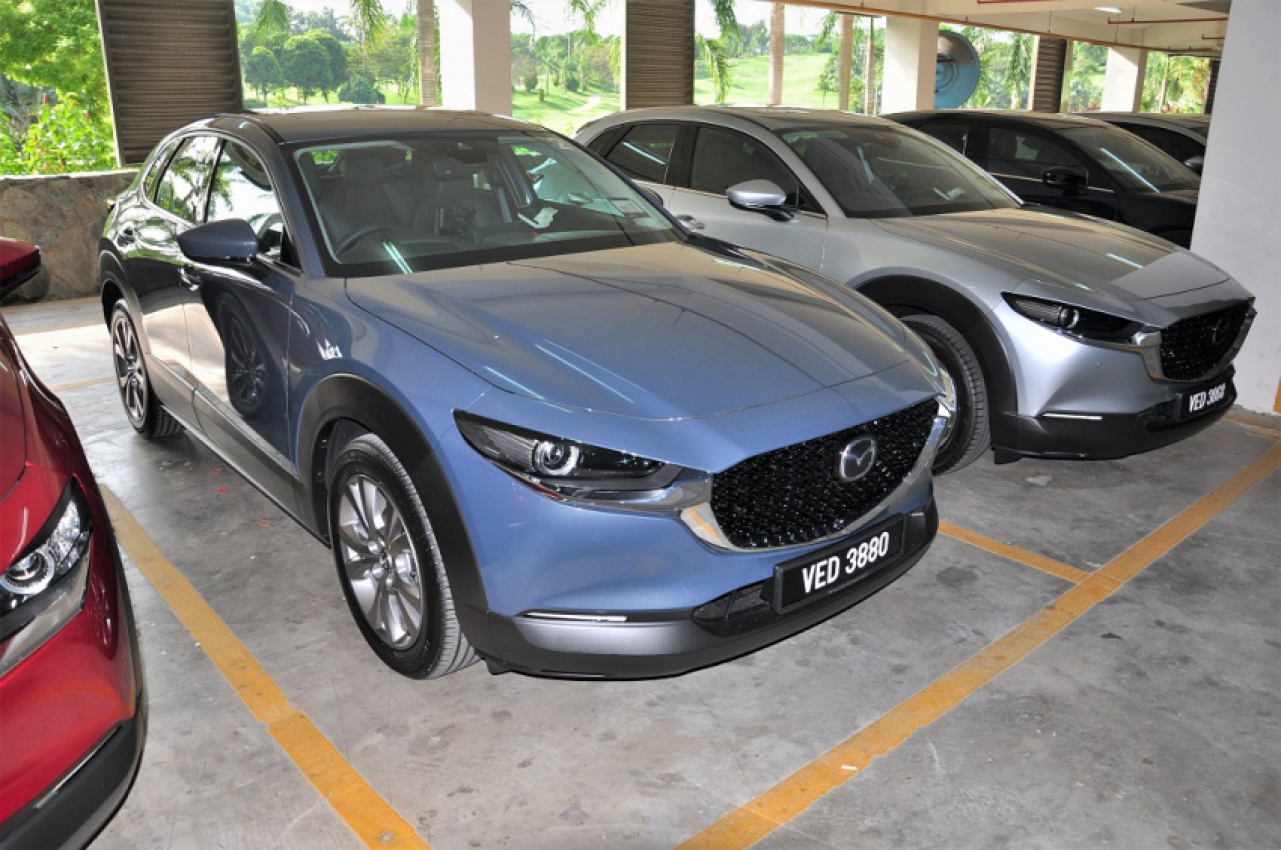 autos, car brands, cars, mazda, automotive, bermaz, cars, crossover, launch, malaysia, mazda cx-3, mazda cx-30, mazda motor corporation, mazda cx-30 launched in malaysia; priced from rm143,059