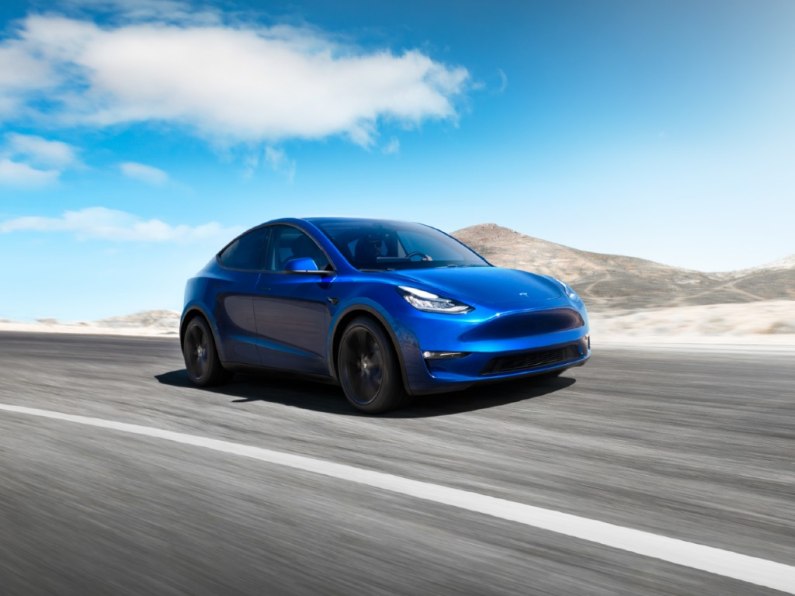 autos, cars, tesla, car news, tesla model y 2020: us customers take delivery two years ahead of uk market debut