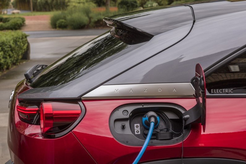autos, cars, mazda, car news, mazda partners up with newmotion for ev charging solutions