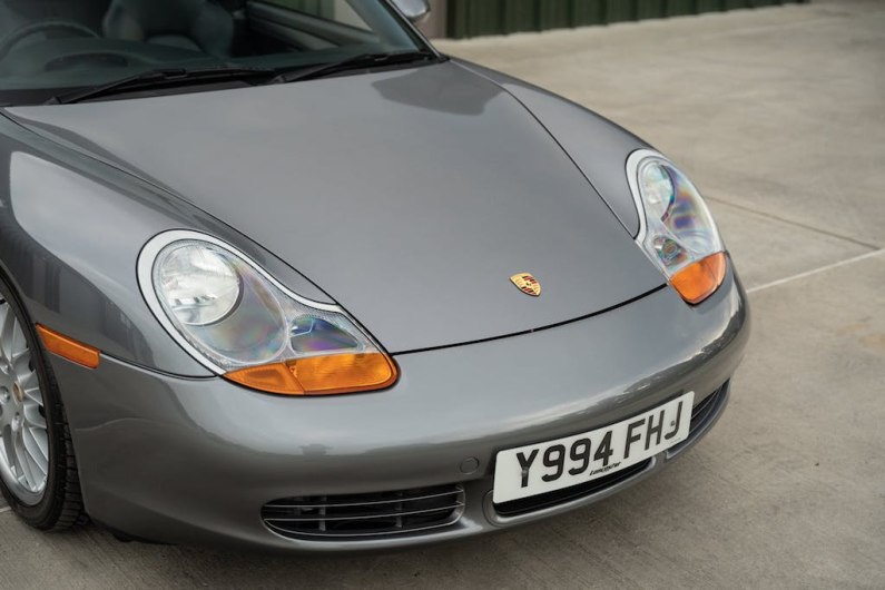 autos, cars, geo, peugeot, porsche, car news, cars on sale, classic car, this 20-year old 5000-mile boxster is a ‘new’ porsche for peugeot money