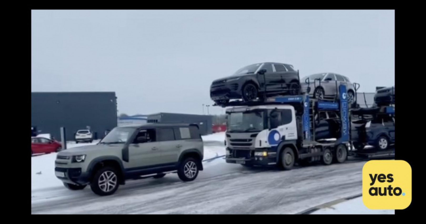 autos, cars, land rover, car news, car repair, land rover defender, review, watch a land rover defender rescue a car transporter stuck in the snow