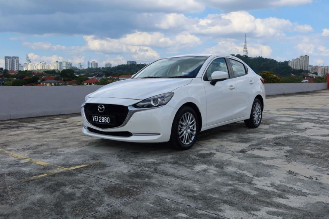 autos, cars, mazda, reviews, 2021 mazda 2 sedan facelift, android, mazda 2, mazda malaysia, android, paying the cost to be the boss - review: 2021 mazda 2 sedan facelift