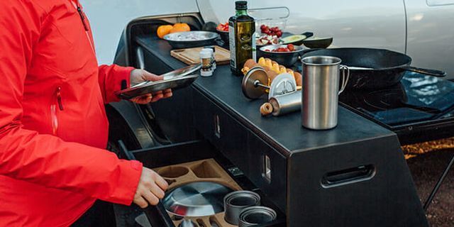 autos, cars, rivian, auto news, rivian camp kitchen, rivian r1t, the rivian r1t camp kitchen is one of the coolest factory optional add-ons you can buy