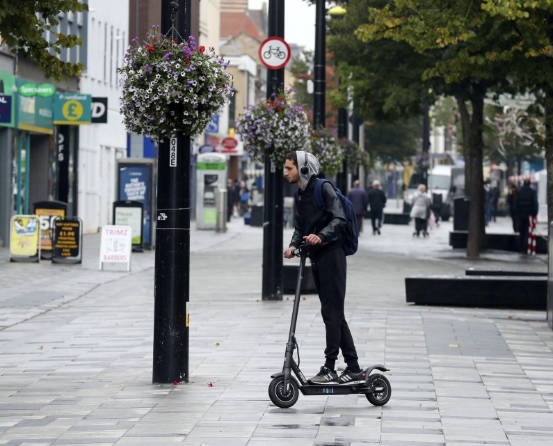 autos, cars, car news, highway code, e-scooters should be legalised on uk roads within 18 months, say mps