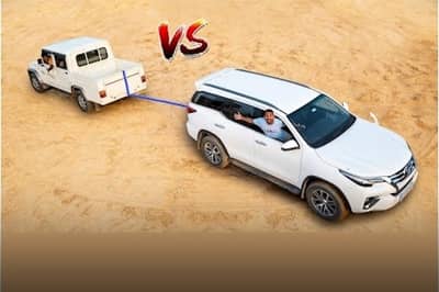 article, autos, cars, mahindra, toyota, fortuner, toyota fortuner, epic tug of war: mahindra bolero camper vs toyota fortuner