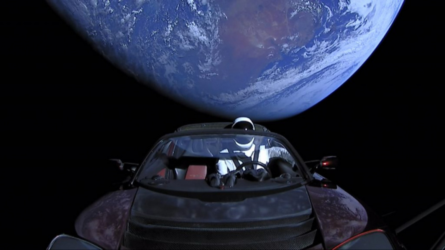 autos, cars, tesla, elon musk, news, roadster, elon musk’s tesla roadster is watching us all from orbit 4 years later