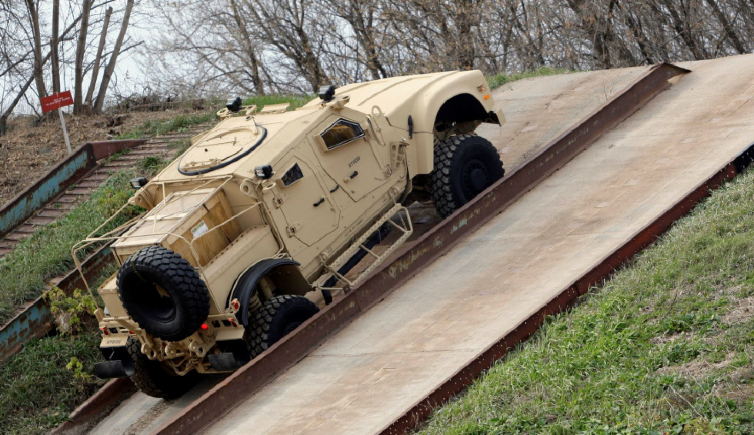 autos, cars, fisker, humvee, oshkosh defense winning where foxconn failed with wisconsin-made electric humvee replacement