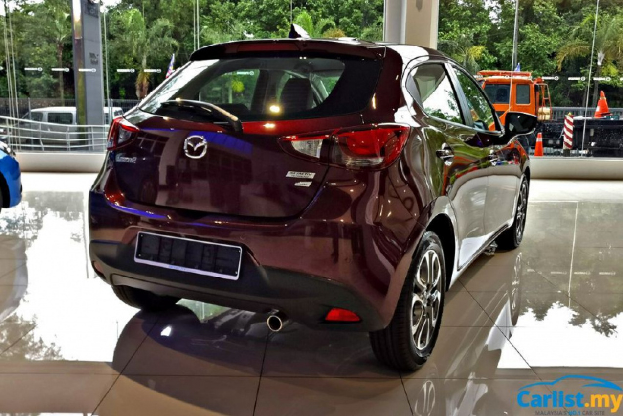 autos, cars, mazda, auto news, mazda 2, 2017 mazda 2 facelift in malaysia, now with gvc