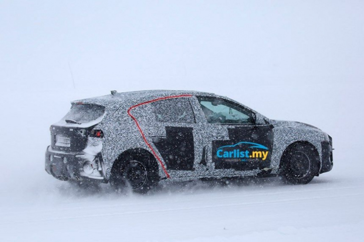 autos, cars, ford, auto news, focus, ford focus, spyshot, spyshots: 2018 ford focus testing in snow