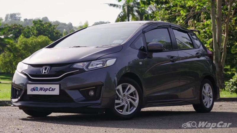 autos, cars, honda, honda jazz, video: used vs new, should you go for a brand-new perodua myvi or get a 2015 honda jazz gk5?