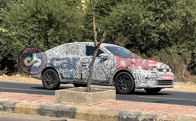 android, autos, cars, volkswagen, auto news, carandbike, news, volkswagen compact sedan, volkswagen compact sedan india, volkswagen india, volkswagen virtus, volkswagen virtus compact sedan, android, upcoming volkswagen compact sedan teased ahead of india debut next month