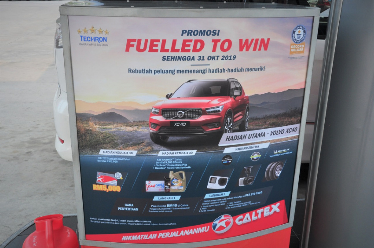 autos, cars, featured, caltex, caltex malaysia, chevron, chevron malaysia ltd, grab car, grab malaysia, malaysia, merdeka, promotion, sixty two grab cars dressed in caltex livery to mark malaysia’s 62nd independence day