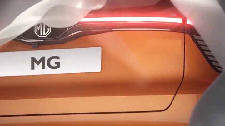 autos, cars, mg, electric car, indian, international, launches & updates, teaser, mg teases all-new electric car; debut in q4 this year
