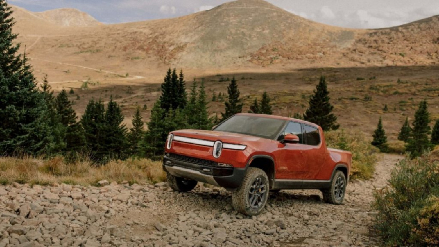 autos, cars, electric vehicle, rivian, towing, how far can electric trucks tow?