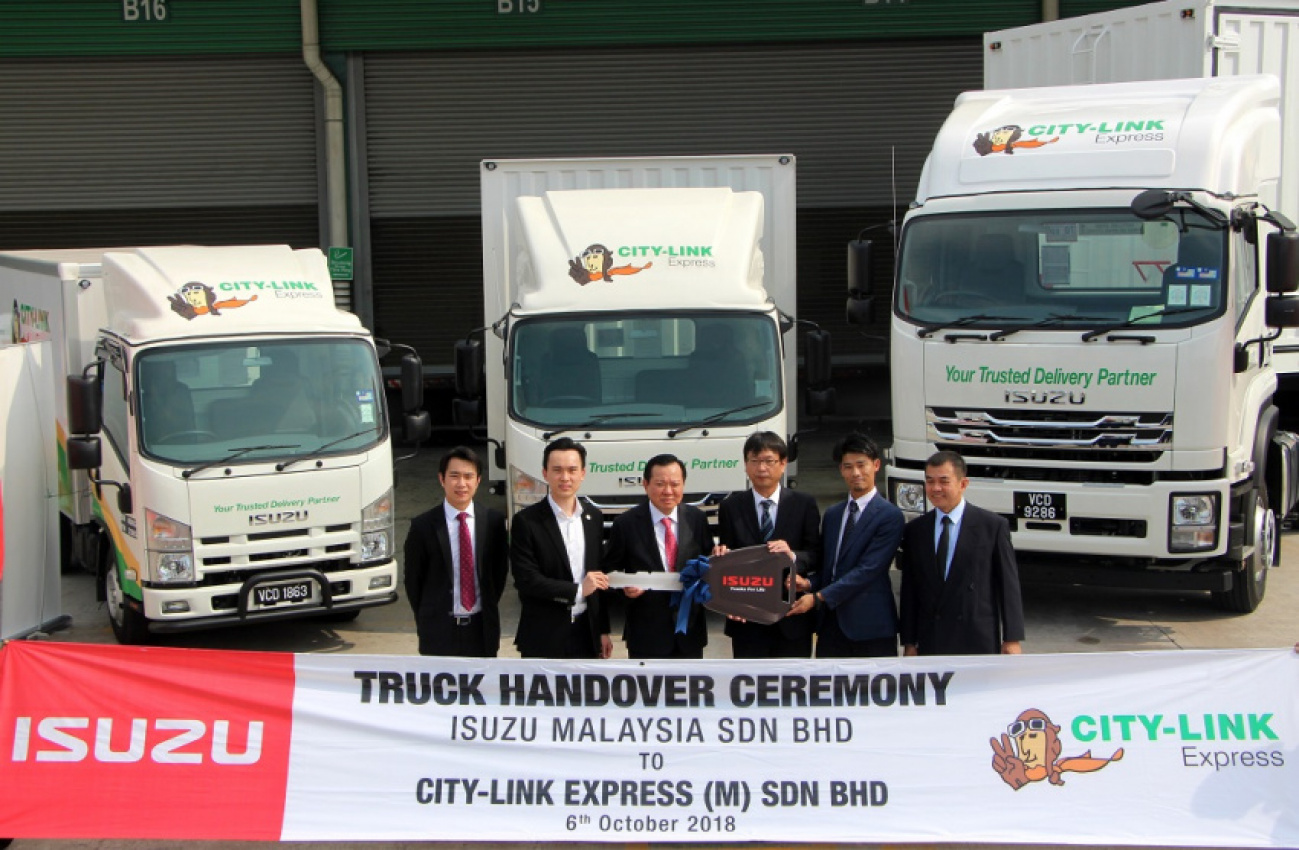 autos, cars, commercial vehicles, isuzu, city-link express, isuzu trucks, malaysia, trucks, isuzu malaysia delivers 141 trucks to city-link express courier service