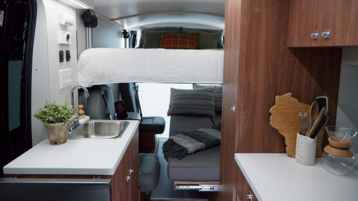autos, cars, ram, vehicle-genres, the procamp's trick drop-down bed turns a ram promaster into a queen-sized camp master