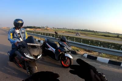article, autos, cars, drag race between a 155cc scooter and a 155cc bike? bring it on!!