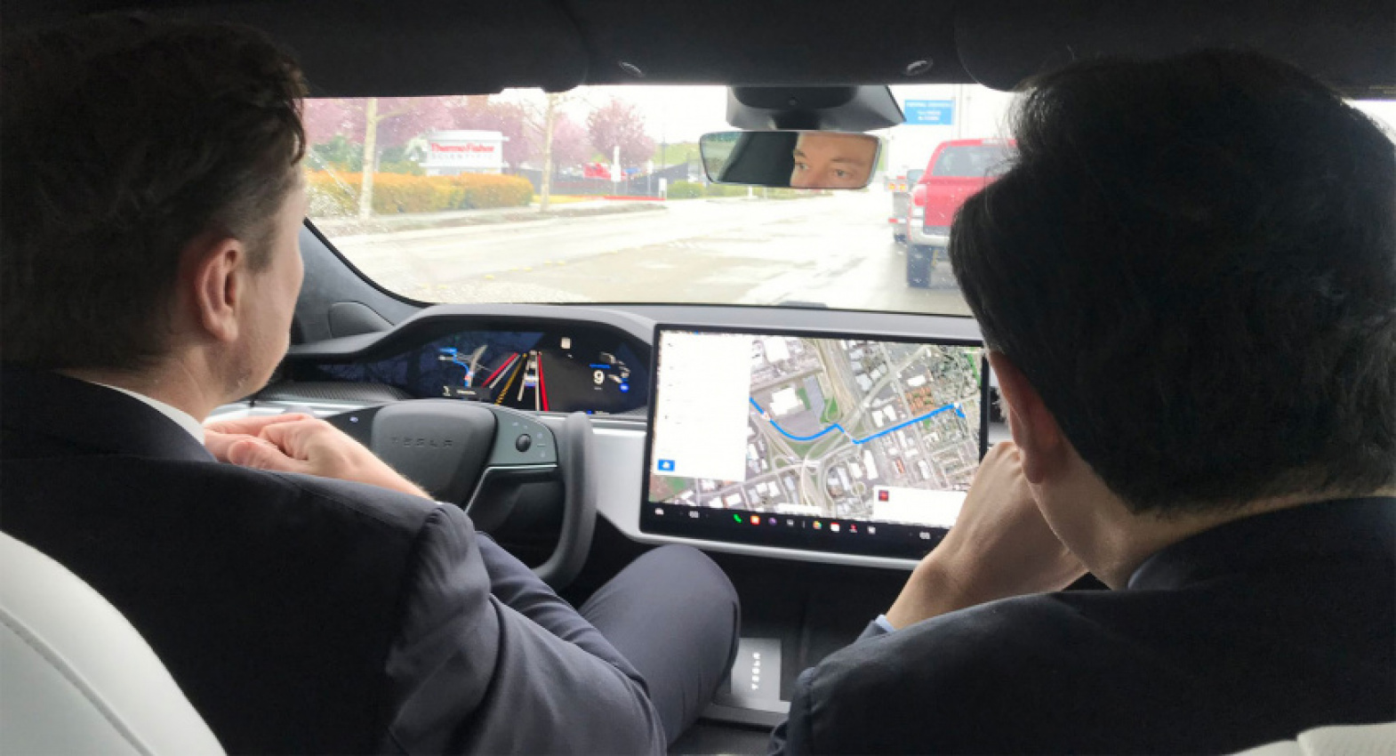 autos, cars, news, tesla, china, electric vehicles, tesla model s, elon musk takes chinese ambassador for a spin in the tesla model s plaid