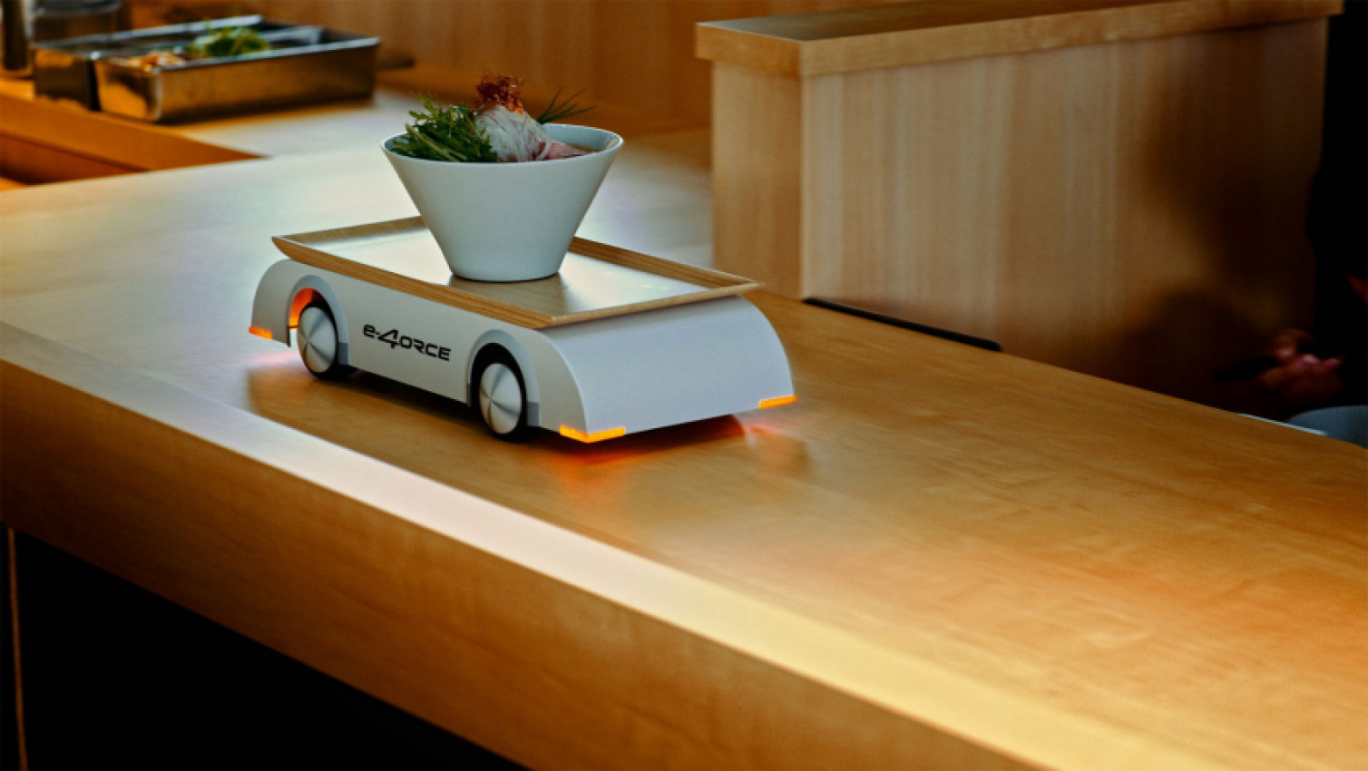 autos, cars, news, nissan, ram, electric vehicles, nissan ariya, nissan videos, video, nissan uses ariya’s e-4orce technology to deliver ramen bowls without spills