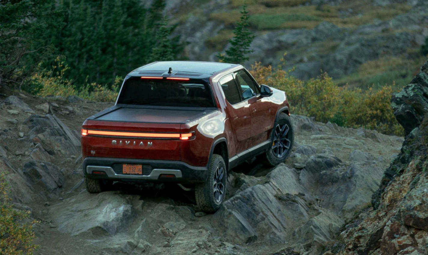 autos, cars, news, rivian, amazon, electric vehicles, rivian r1s, rivian r1t, amazon, rivian lost $2.4 billion last quarter and delivered 909 vehicles