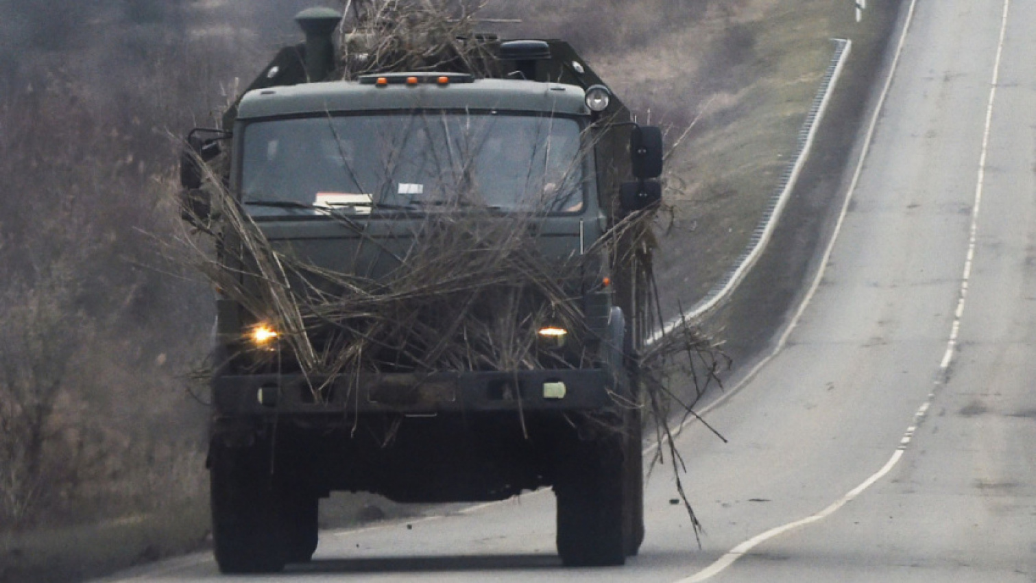 autos, cars, news, trucks, weird car news, russian military uses wood logs for armor on convoy trucks