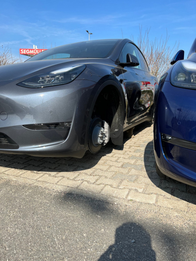 autos, cars, news, tesla, germany, offbeat news, tesla model 3, tesla model y, thieves steal wheels and aero caps from a dozen teslas parked in german delivery center