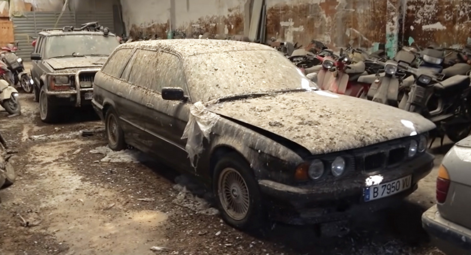 autos, bmw, cars, news, barn finds, bmw m5, bmw videos, classics, abandoned bmw dealership in spain holds a trove of motoring treasures