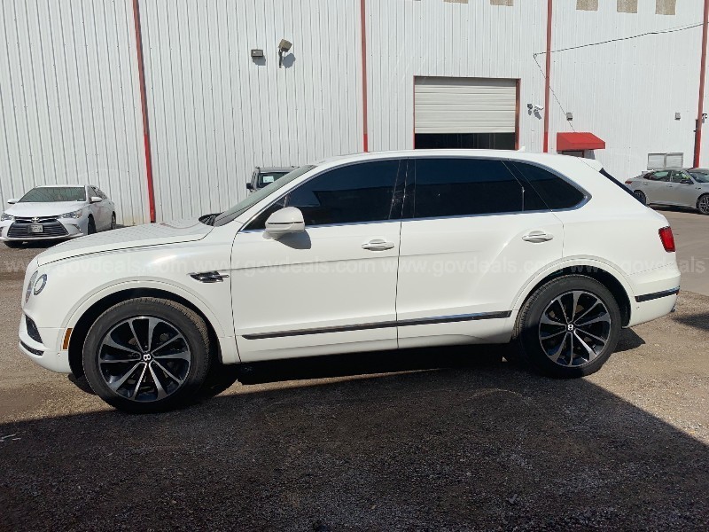 autos, bentley, cars, news, auction, bentley bentayga, used cars, the us postal service has a bentley bentayga and it’s up for auction