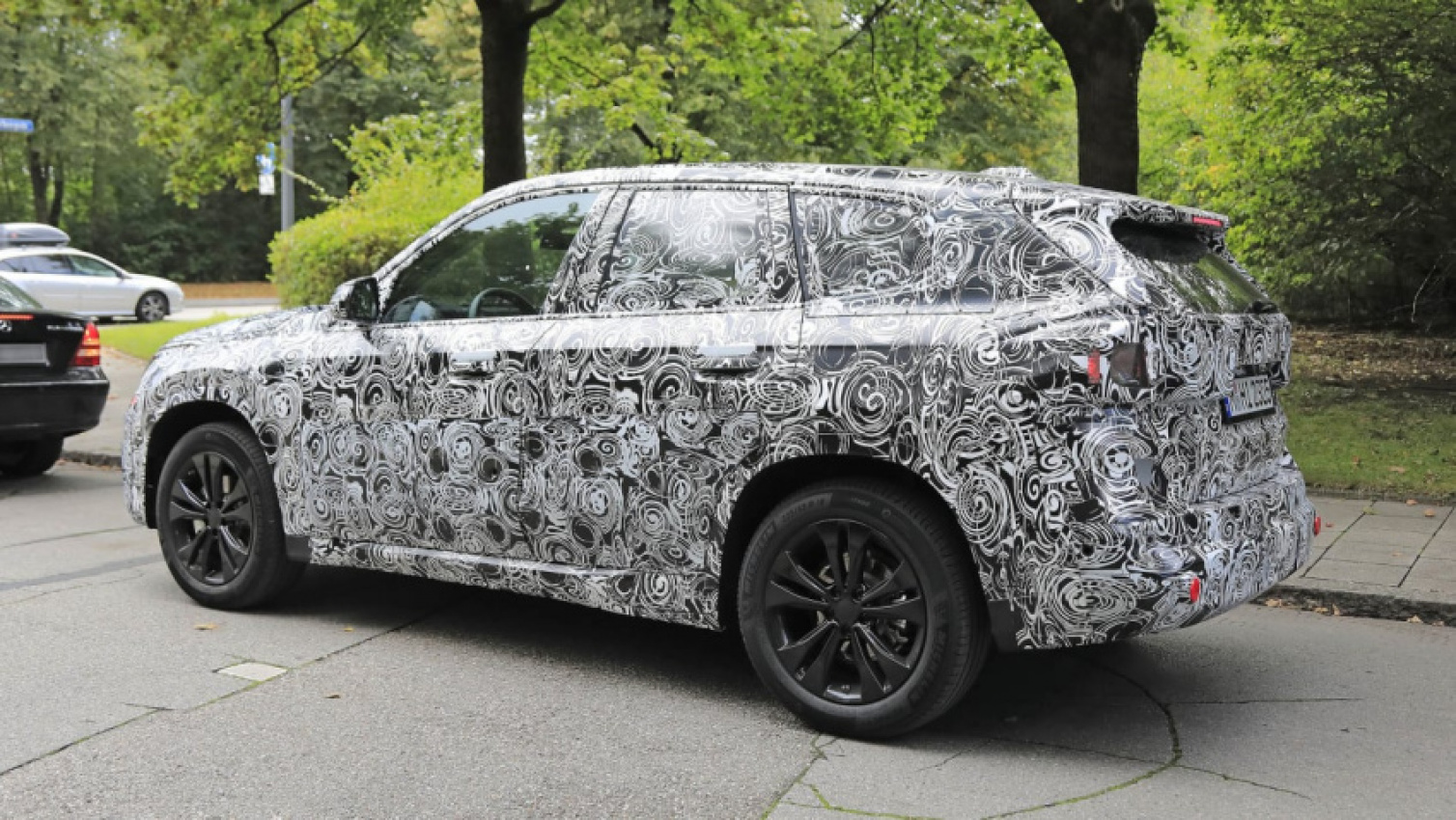 autos, bmw, cars, reviews, bmw x1, family suvs, new electric bmw x1 teased ahead of 2023 launch