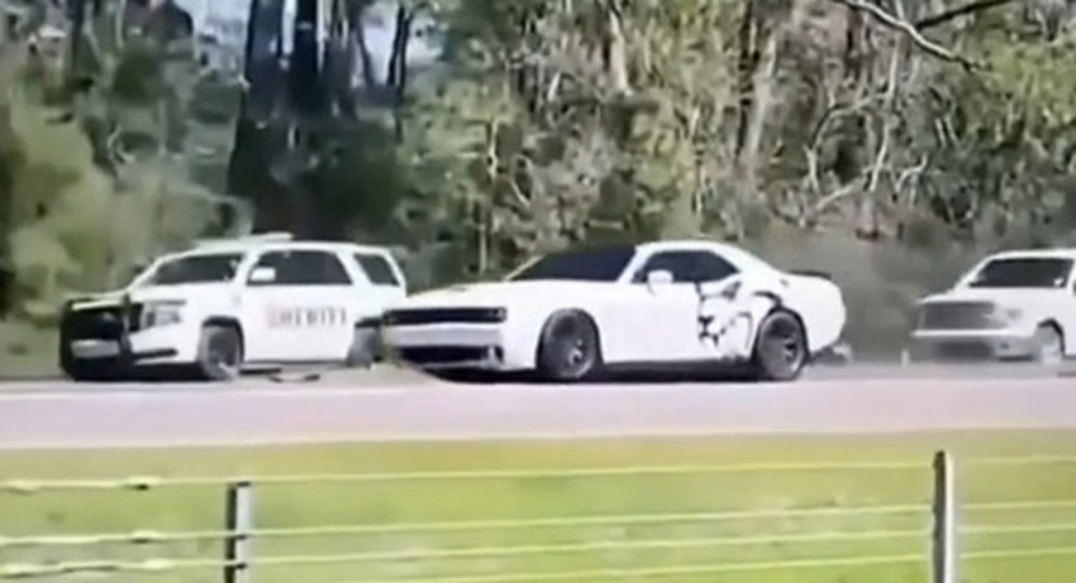 autos, cars, dodge, news, accidents, dodge challenger, dodge videos, offbeat news, police, police cars, video, unlicensed dodge challenger hellcat driver running away from police strikes officer