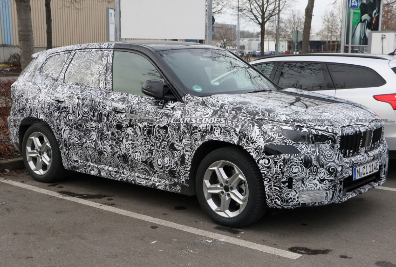 autos, bmw, cars, news, bmw videos, bmw x1, electric vehicles, teaser, video, electric bmw ix1 teaser confirms late 2022 debut and a 272-mile range