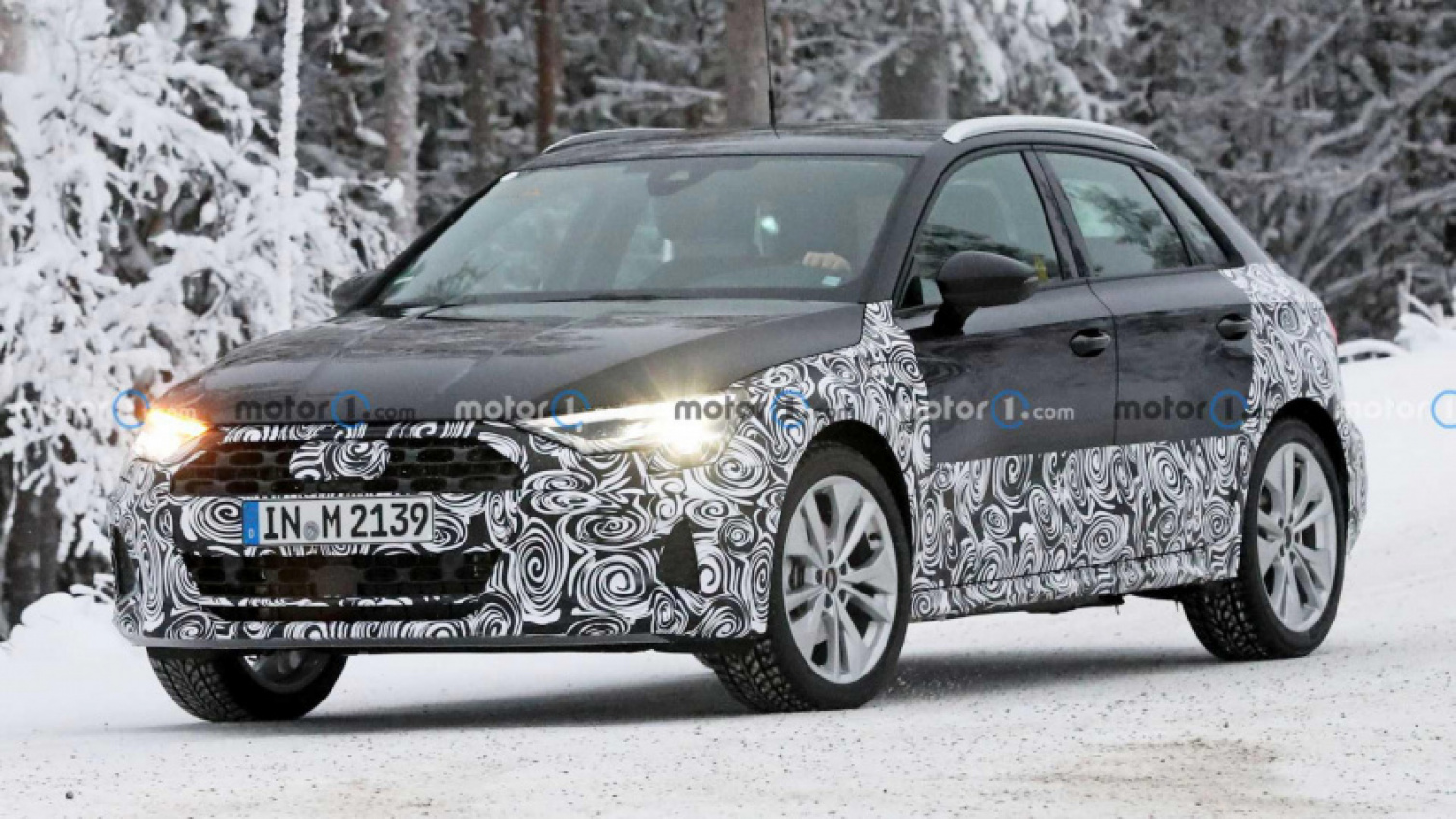audi, autos, cars, audi a3, vnex, high-riding audi a3 spied in the snow looking like an allroad