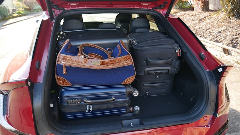 autos, cars, kia, crossover, driveway tests, electric, green, hatchback, luggage test, kia ev6 luggage test | how big is the trunk?