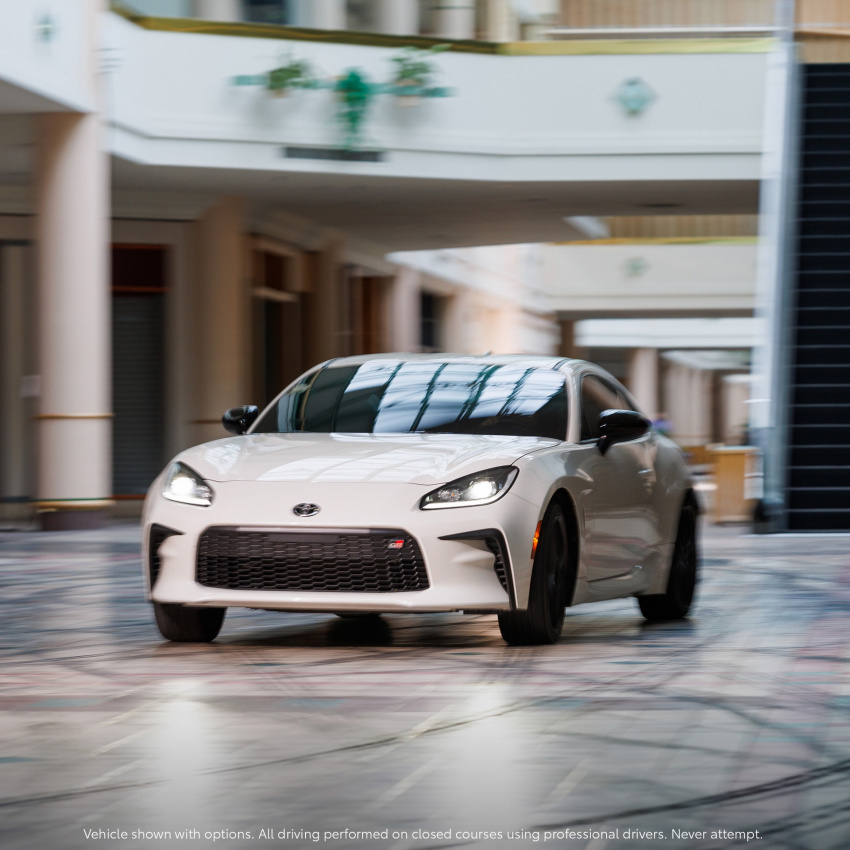 autos, cars, news, toyota, commercials, toyota gr 86, toyota supra, toyota videos, video, toyota sends a 2022 gr86 drifting through a mall in new “focus group” commercial